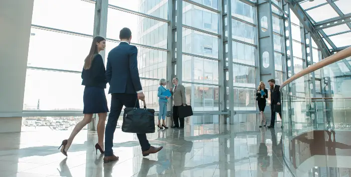 Government Facilities Government workers walking through a government office building